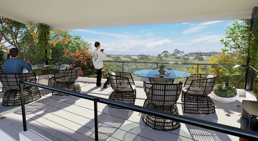 Terraza mirador con mesa y sillas frente a la vista